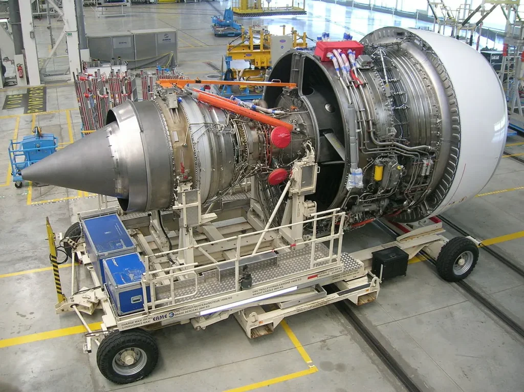 Rolls-Royce Trent 900 aircraft engine turbine displayed in an aerospace facility showcasing advanced turbine technology and engineering details
