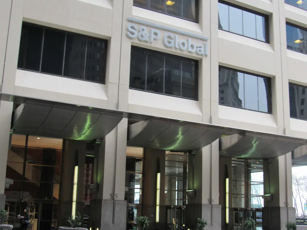 The main entrance of S&P Global headquarters at 55 Water Street, New York City, showcasing the company's corporate office location