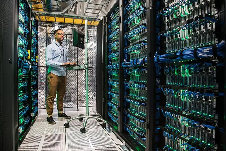 Data center server racks powering cloud infrastructure, representing Oracle's cloud technology environment 