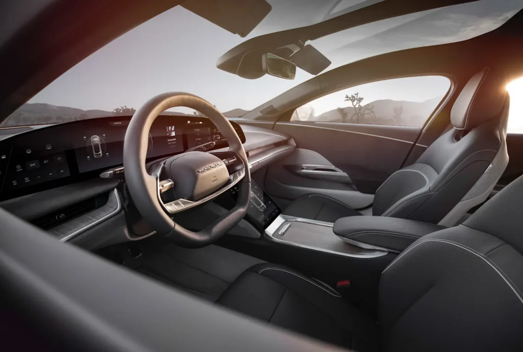 Luxury interior of the Lucid Air electric sedan showcasing its modern digital dashboard and premium seating