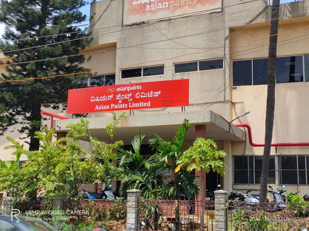 Asian Paints Limited branch office exterior in Peenya Industrial Area, Bangalore, showcasing company signage and surroundings 