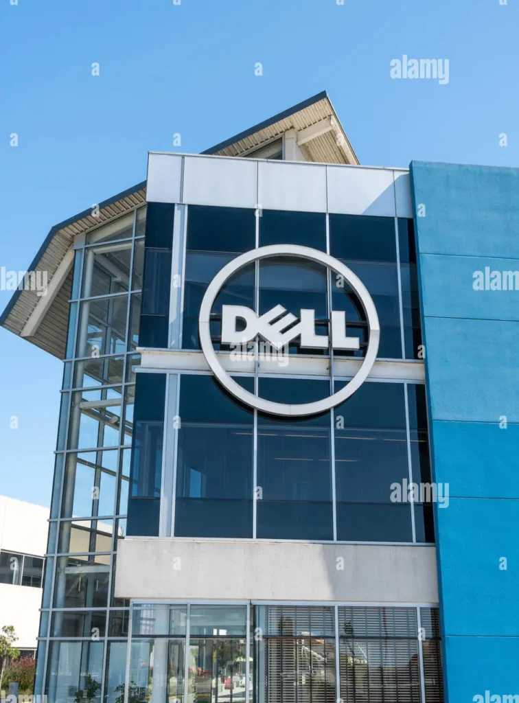 Exterior view of a Dell Technologies building featuring the company's iconic logo against a clear blue sky 
