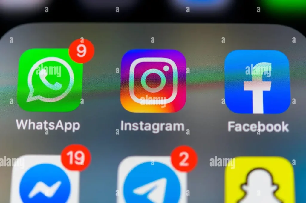 Popular Meta-owned social media and messaging apps on a smartphone screen with notification alerts