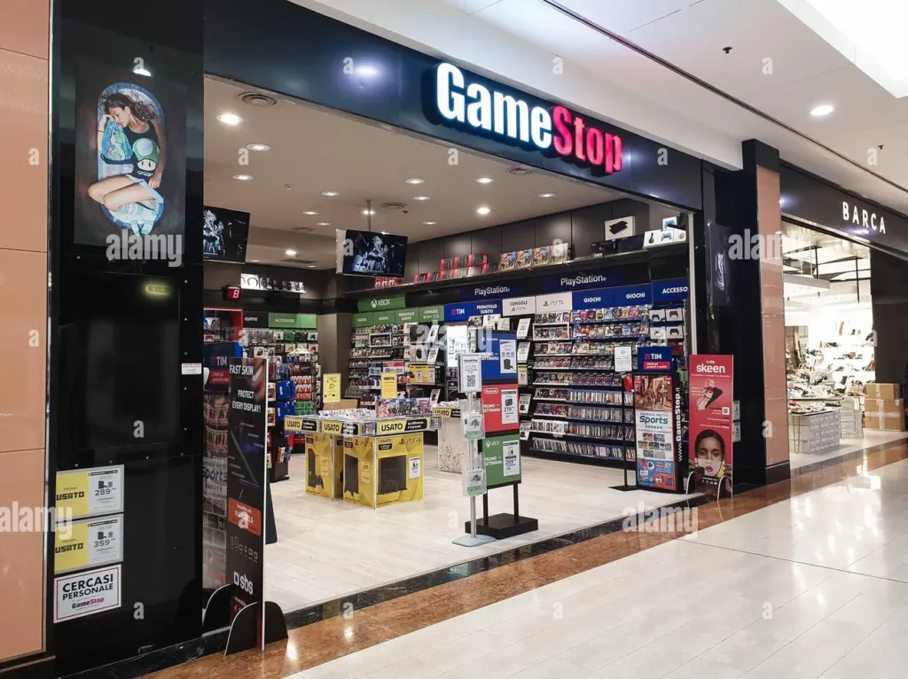 GameStop storefront in a mall showcasing video games, consoles, and gaming accessories, illustrating the company's retail presence 