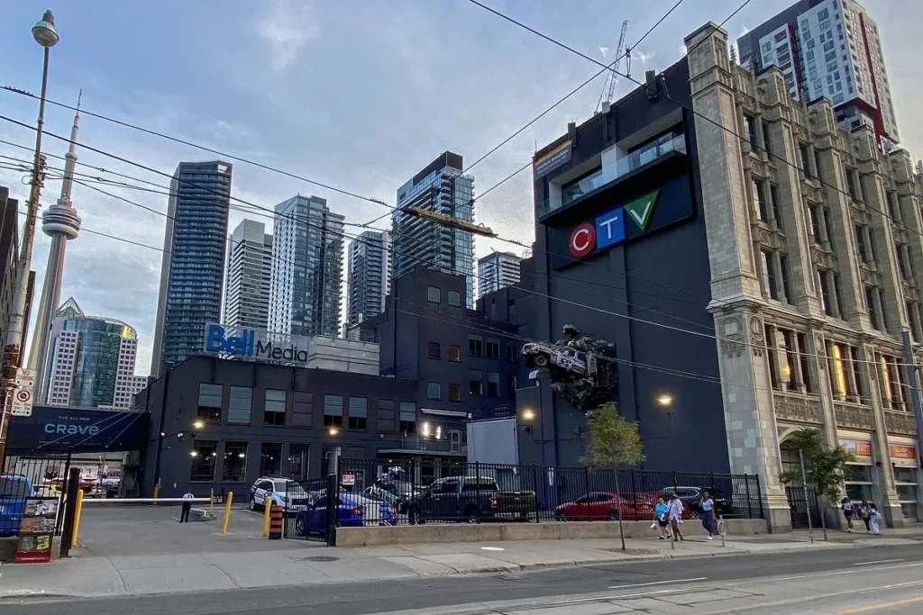 Bell Media headquarters in Toronto with CTV building nearby, integrating BNN Bloomberg's corporate environment 