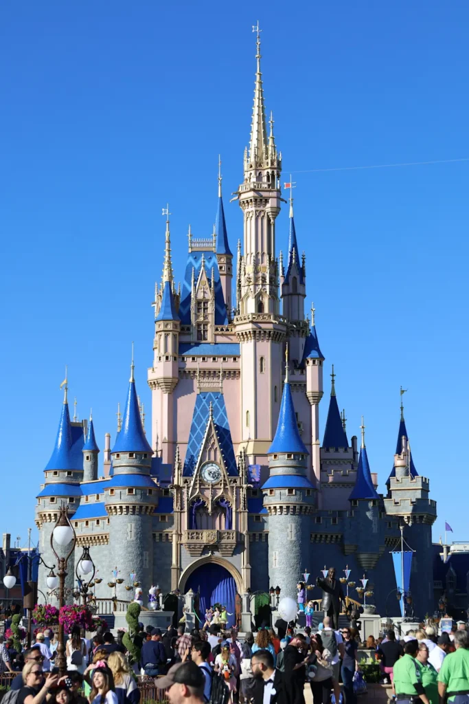 The Cinderella Castle at Disney World's Magic Kingdom, symbolizing the magical experience offered by Disney theme parks 
