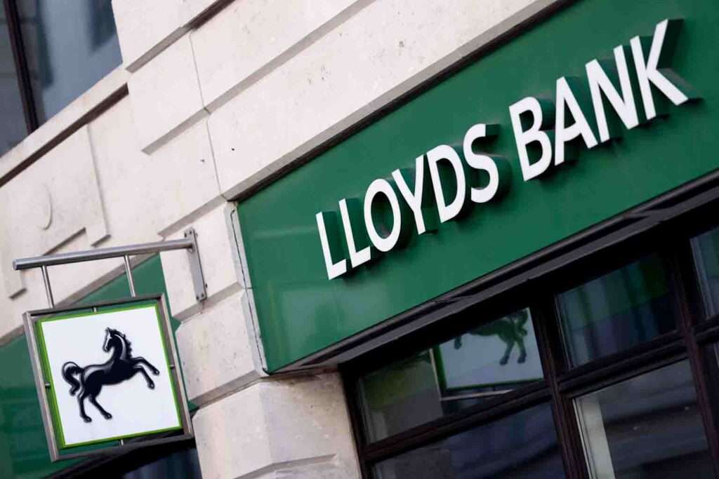 Exterior signage of Lloyds Bank branch featuring the iconic black horse logo and green branding 