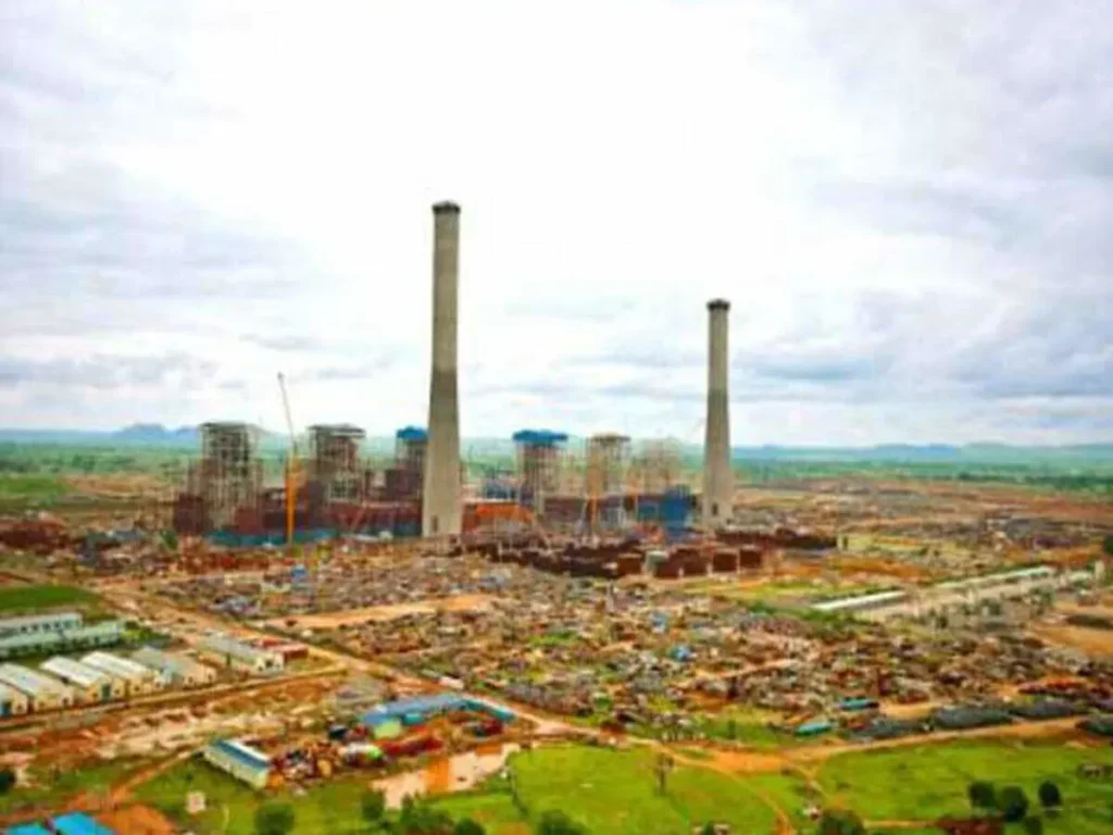Aerial view of the Sasan thermal coal power plant infrastructure showing tall chimneys and industrial layout 
